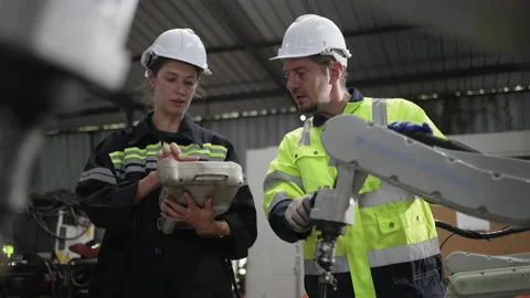 Engineer work at robotic arm factory. Stock Footage 239699493