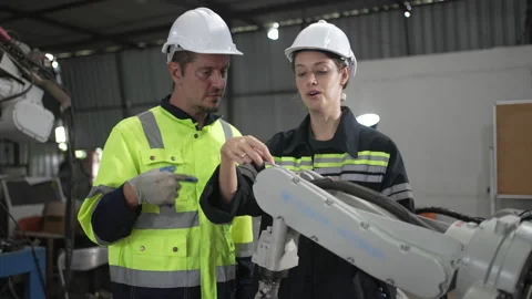 Engineer work at robotic arm factory. Stock Footage 239699608