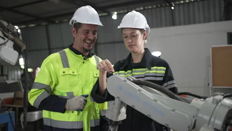 Engineer work at robotic arm factory. Stock Footage 239699634
