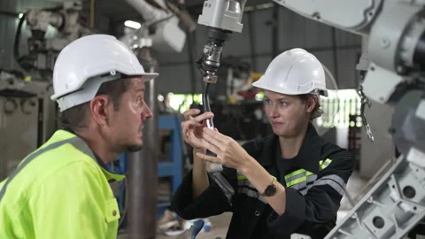 Engineer work at robotic arm factory. Stock Footage 239699674