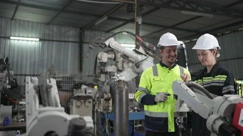 Engineer work at robotic arm factory. Stock Footage 239699682