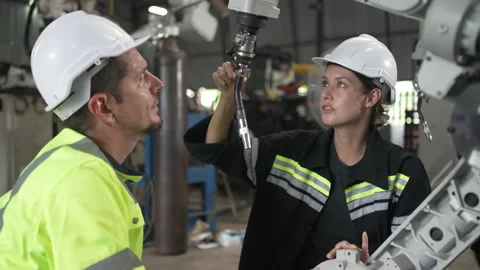 Engineer work at robotic arm factory. Stock Footage 239699745