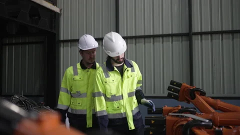 Engineer work at robotic arm factory. Stock Footage 239699833