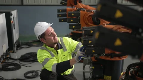 Engineer work at robotic arm factory. Stock Footage 239699927