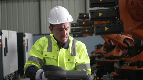 Engineer work at robotic arm factory. Stock Footage 239699958