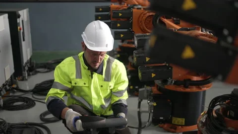 Engineer work at robotic arm factory. Stock Footage 239699983