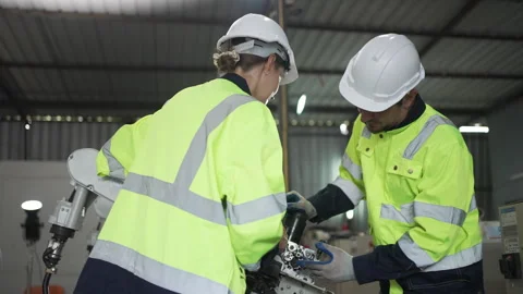 Engineer work at robotic arm factory. Stock Footage 241876363