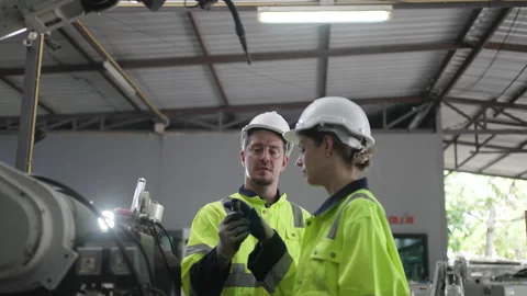 Engineer work at robotic arm factory. Stock-Footage 241877200