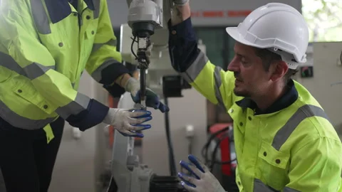 Engineer work at robotic arm factory. Stock-Footage 241877413
