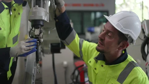Engineer work at robotic arm factory. Stock-Footage 241877544