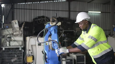 Engineer work at robotic arm factory. Stock Footage 244561247