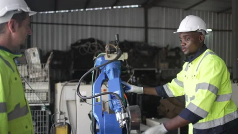 Engineer work at robotic arm factory. Stock Footage 244561261
