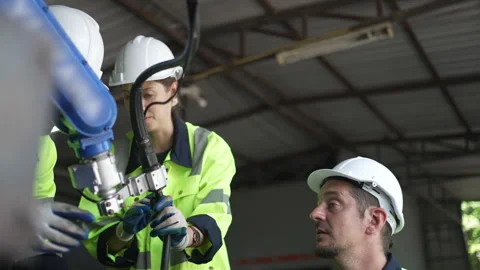 Engineer work at robotic arm factory. Stock Footage 244561317