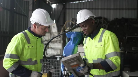 Engineer work at robotic arm factory. Stock Footage 244561330