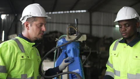 Engineer work at robotic arm factory. Stock Footage 244561542