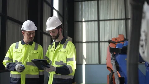 Engineer work at robotic arm factory. Stock Footage 244561695