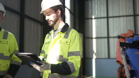 Engineer work at robotic arm factory. Stock Footage 244561707
