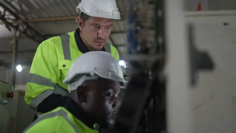 Engineer work at robotic arm factory. Stockbeeldmateriaal 244561766