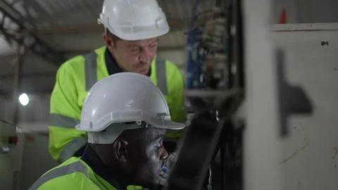 Engineer work at robotic arm factory. Stock Footage 244561784