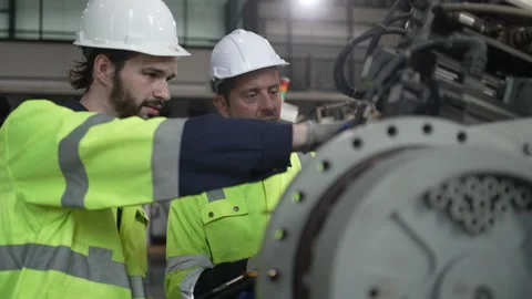 Engineer work at robotic arm factory. Stock Footage 244561872