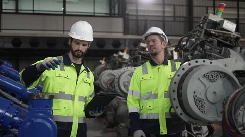Engineer work at robotic arm factory. Stock Footage 244561886