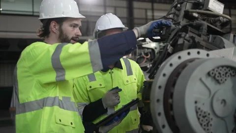 Engineer work at robotic arm factory. Stock Footage 244561900