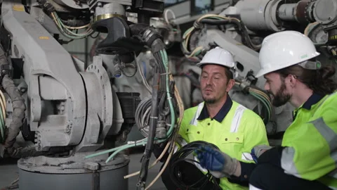 Engineer work at robotic arm factory. Stock Footage 244562177