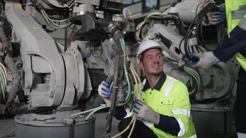 Engineer work at robotic arm factory. Stock Footage 244562178
