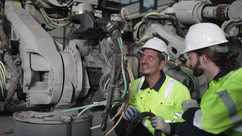 Engineer work at robotic arm factory. Stock Footage 244562183
