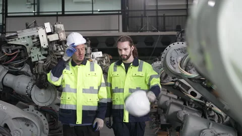Engineer work at robotic arm factory. Stock Footage 244562284