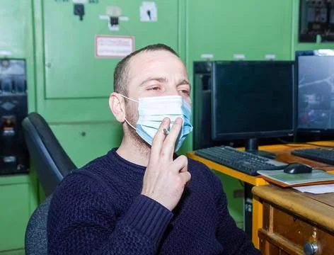 Engineer at work smoking cigarette 스톡 사진