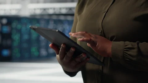 Engineer at work using green screen laptop in data center to check hardware Stock Footage 317206675