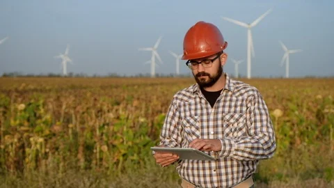 Engineer at Work in a Wind Turbine Power Station. Slow motion Stock Footage 95628406