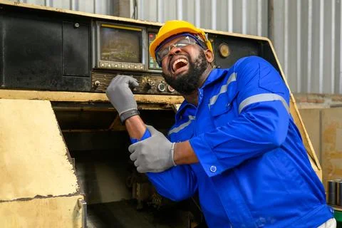 Engineer worker with accident at factory Stock Photos