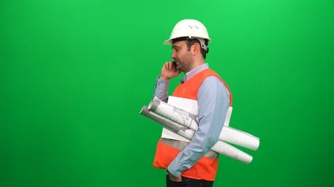 Engineer Worker With Blueprints Talking With Cell Phone, Green Screen Background Stock Footage 88660751