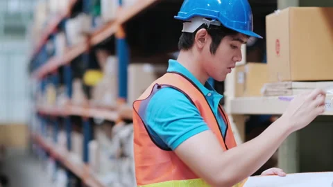 Engineer worker check stock in the warehouse Stock Footage 142523382