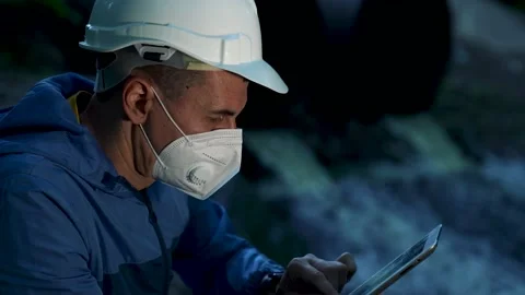 Engineer worker checking water quality of river. Wastewater treatment test Stock Footage 165464660
