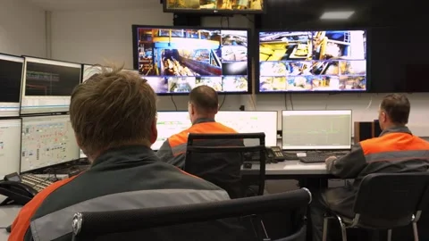 Engineer worker at the control desk in the wood processing industry Video stock 297348615