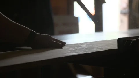 Engineer worker cutting wood with table saw in shipyard Video stock 116513258