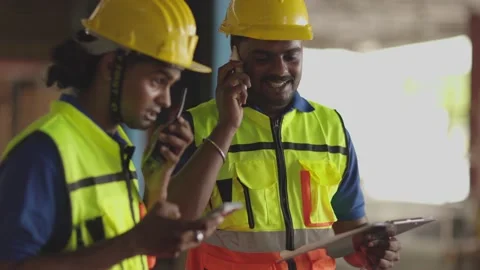 Engineer worker foreman Hispanic indian using telephone calling communication  Stock Footage 201065557