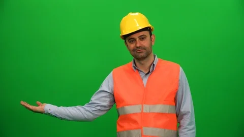 Engineer Worker Lifting Or Presenting Something on Green Screen Stock Footage 88652598