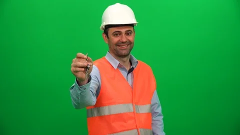 Engineer Worker Man Holding the Key, Buying a Home Concept Stock Footage 88656586
