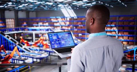 Engineer Worker Using Warehouse Automation Dashboard 스톡 사진
