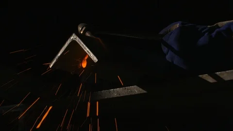 Engineer worker welding metal part with welding machine in shipyard Stock Footage 116512785