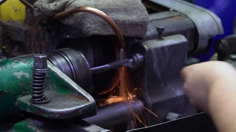 An engineer, a worker working on a milling machine. Manufacture of cutting tools Stock Footage 171776574