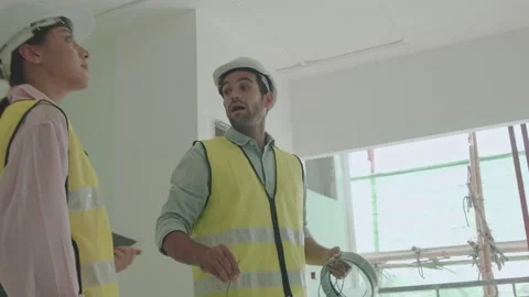 Engineer working and check place to wiring in room Video stock 146888224