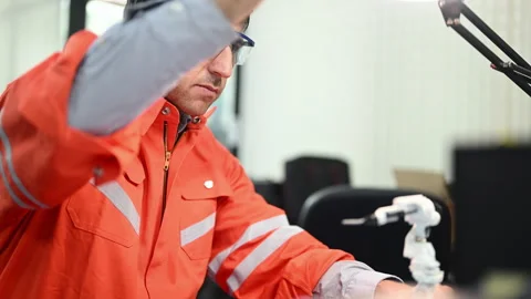 Engineer working and solving problems on machine Stock Footage 241519566