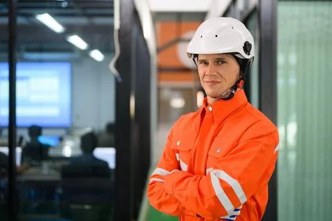 Engineer working and solving problems on machine at industrial plant Stock Photos