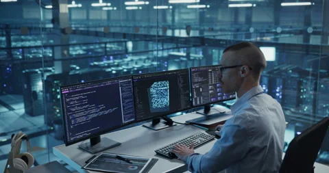 Engineer Working on Computer in Data Center Office Stock Footage 296174736