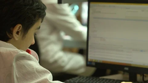 Engineer working on a computer Stock Footage 100038379